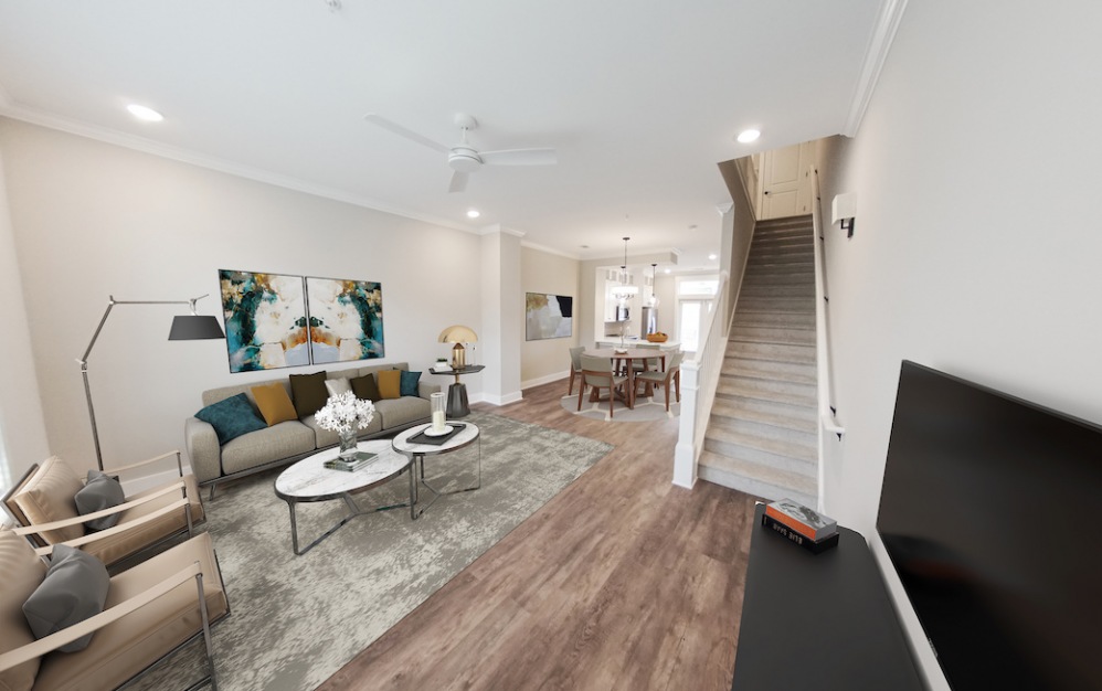Open concept townhome with vinyl plank flooring, living area, and more