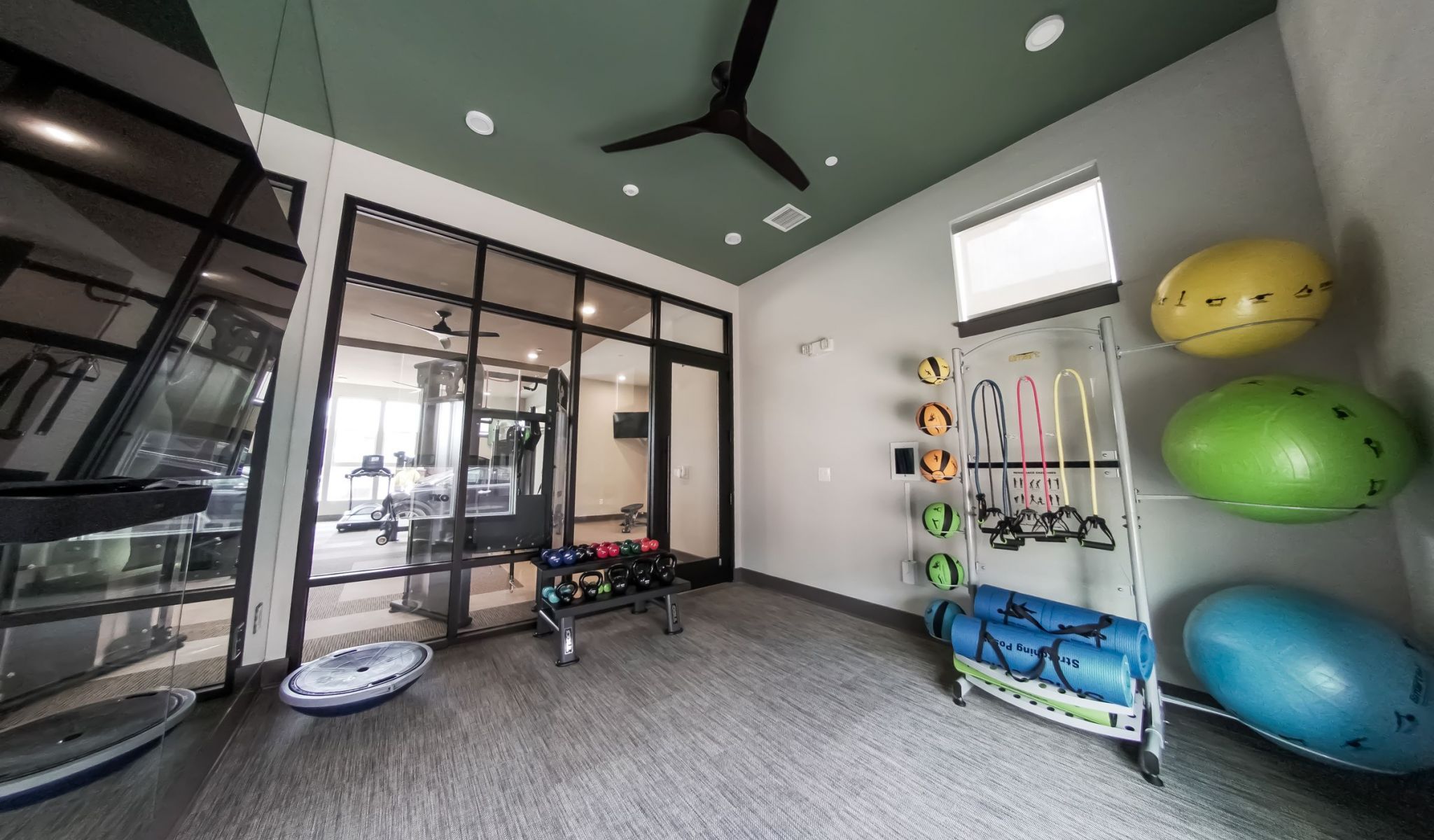 Townhomes at Bridlestone community amenities fitness center with medicine balls and strength training equipment