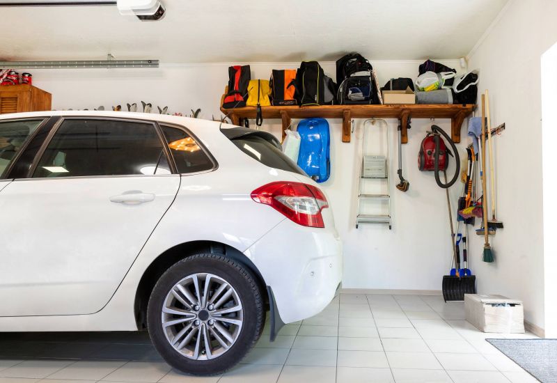 White car parked in an organized garage