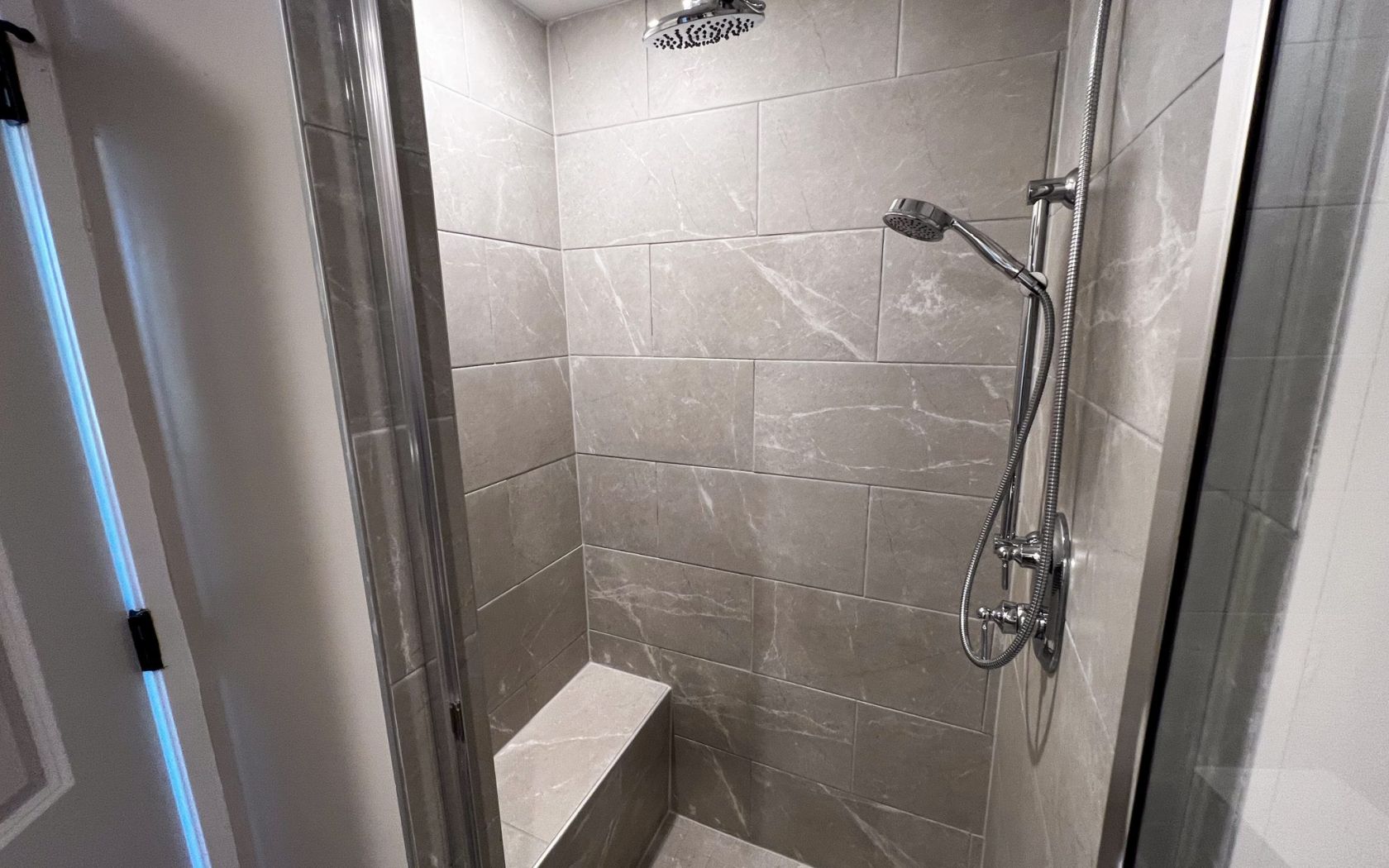 Townhomes at Bridlestone large shower with two showerheads and modern tile